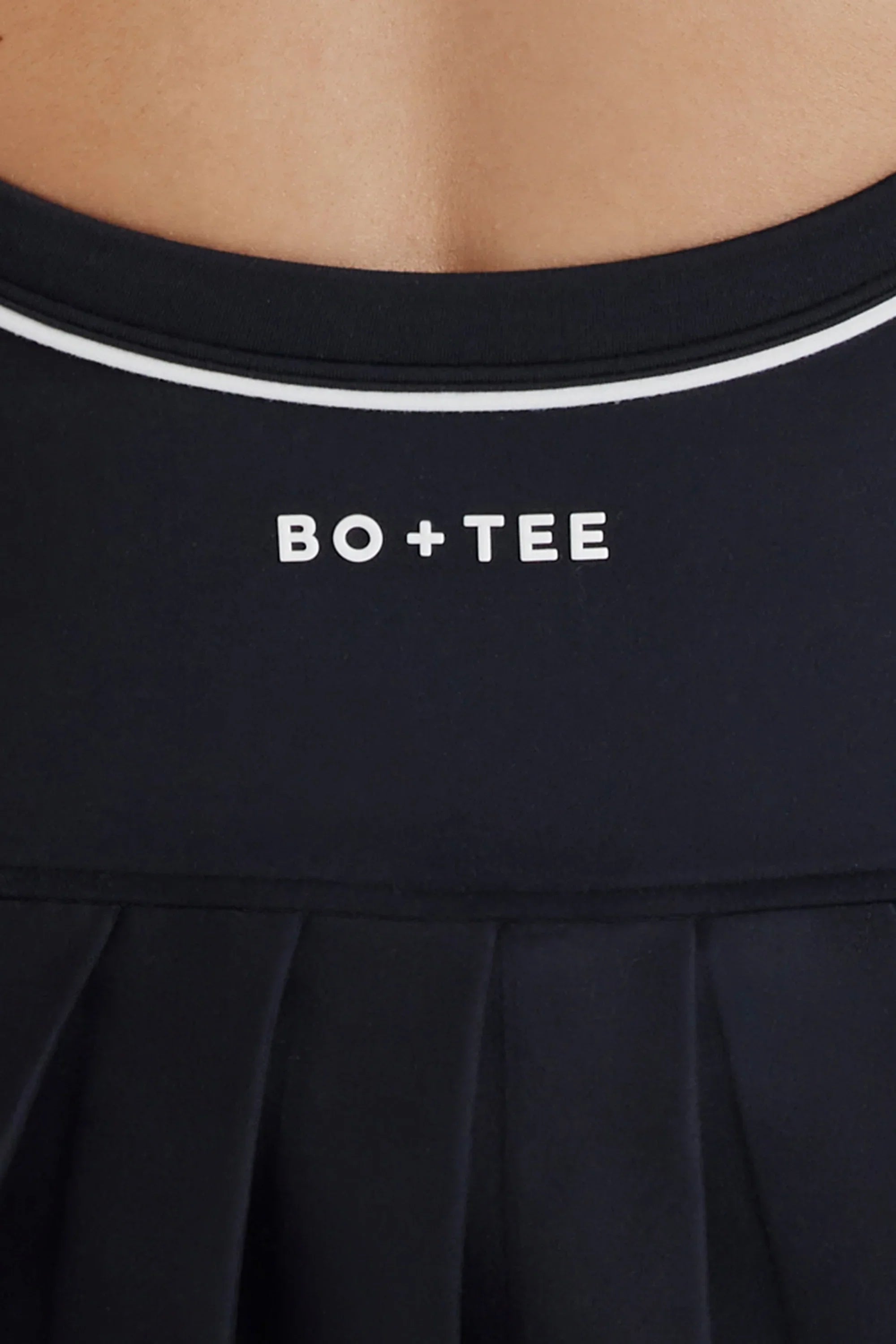 Soft Active Crossback Pleated Tennis Dress in Black